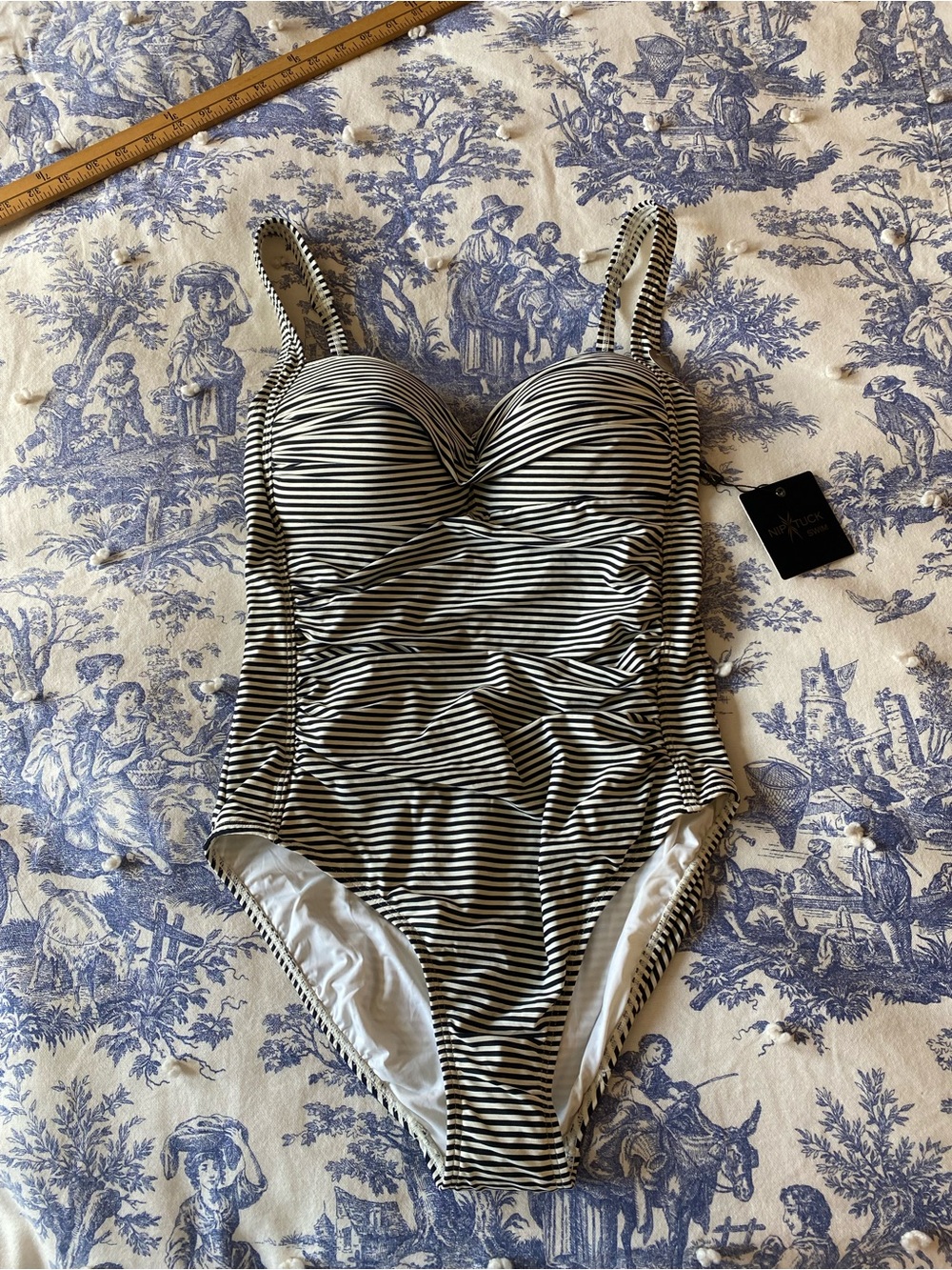 NWT nip tick black and white striped one piece swim suit size US 10